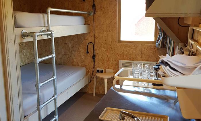 cabin bunk beds with kitchen facilities